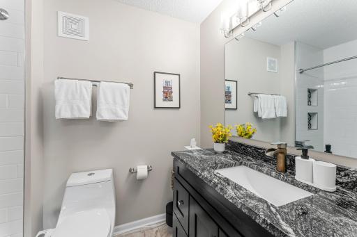 Private Bath features newer Granite Countertop.