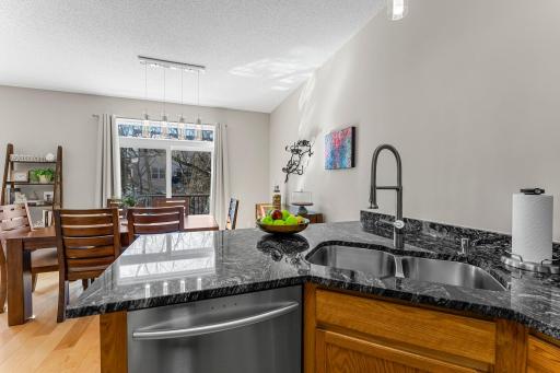 Spacious Kitchen boasts New Granite Countertops, Undermount Sink, and Faucet.