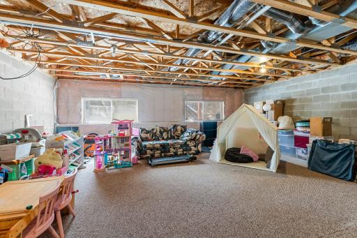 Full Unfinished Lower Level has 2 Daylight Windows and Endless Potential!