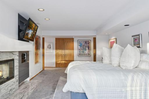 Spacious primary bedroom with private bath and closet space