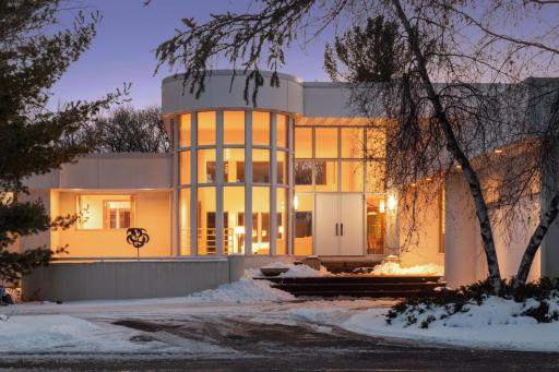 A twilight shot of the impressive front entrance