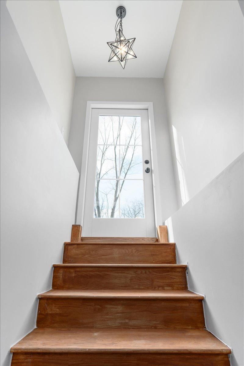 Walk-out basement door to a beautiful patio and large yard