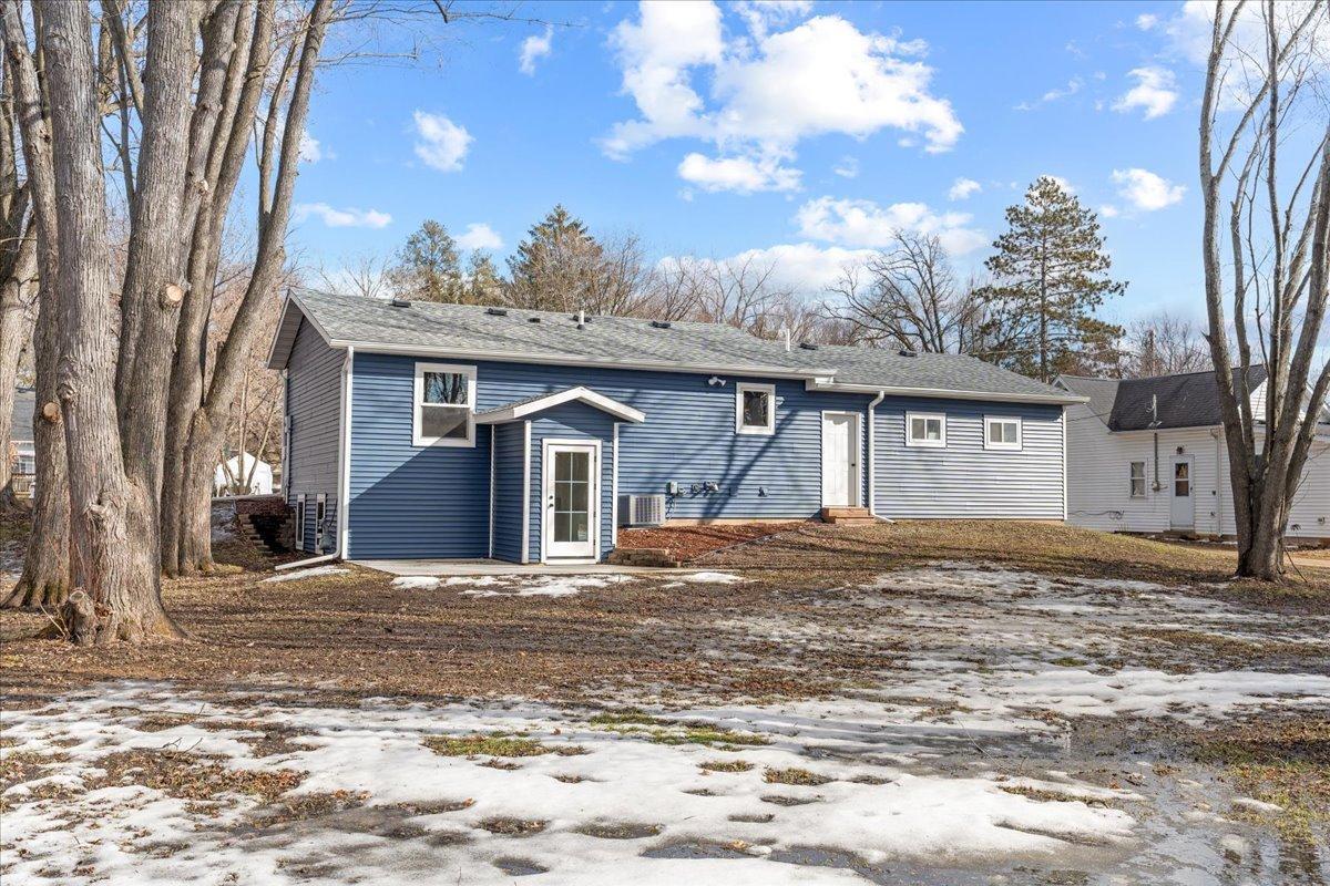 Back of house showing walk-out from basement