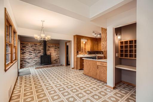 Dining Room/family room in expansion space off the ktiche with wood burning fireplace
