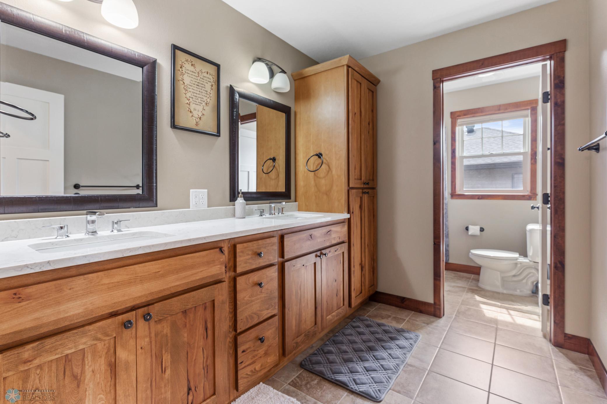 Secondary Full Bath Upper Level- Double Sinks & Compartmentalized