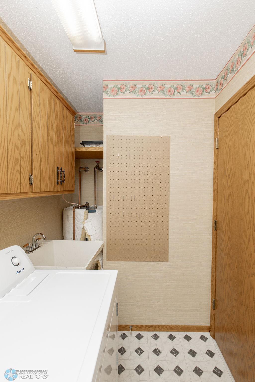 In-unit Laundry + sink