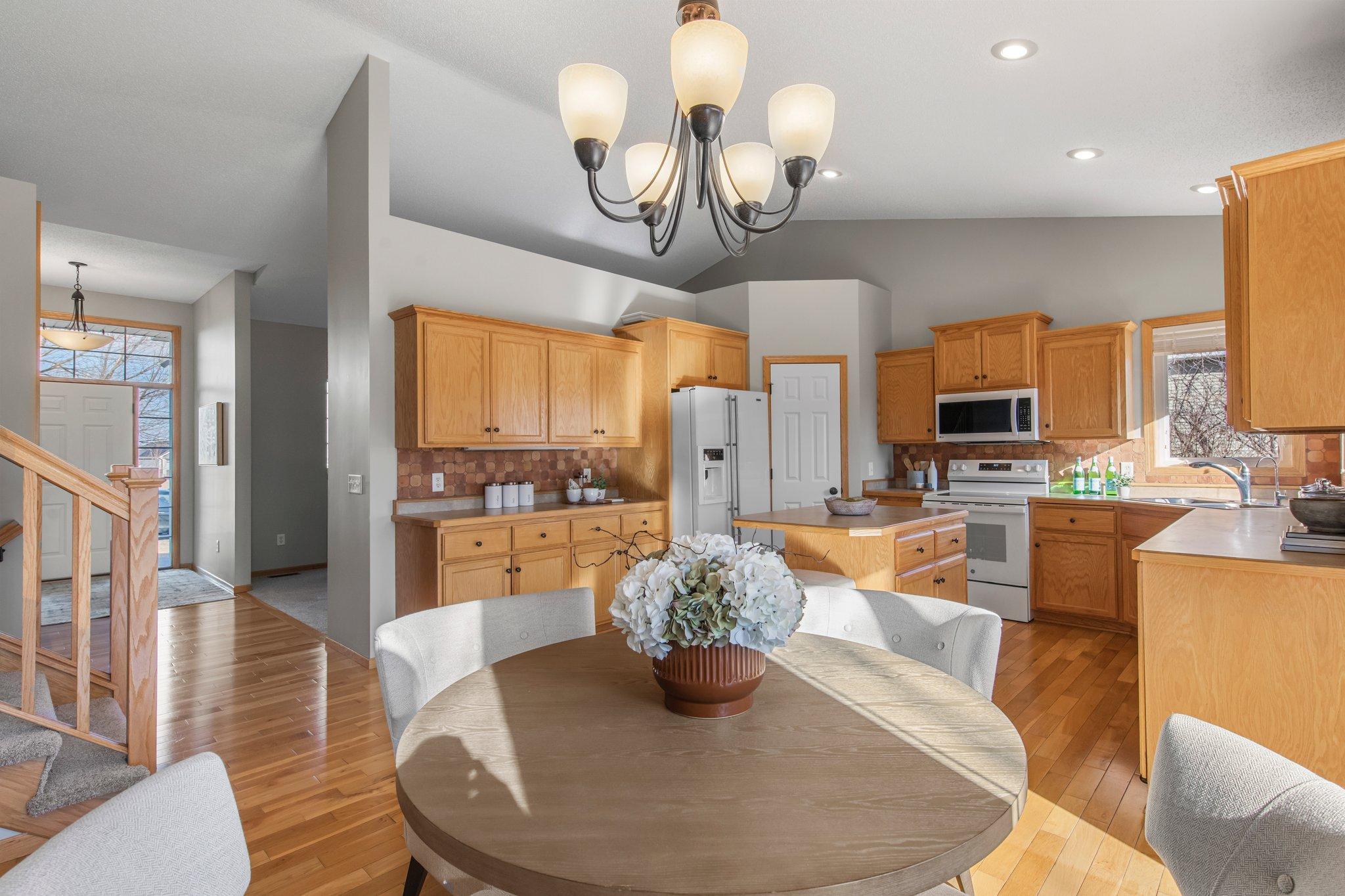 Located just off the kitchen, this inviting dining room offers the perfect setting for enjoying meals and creating memories.