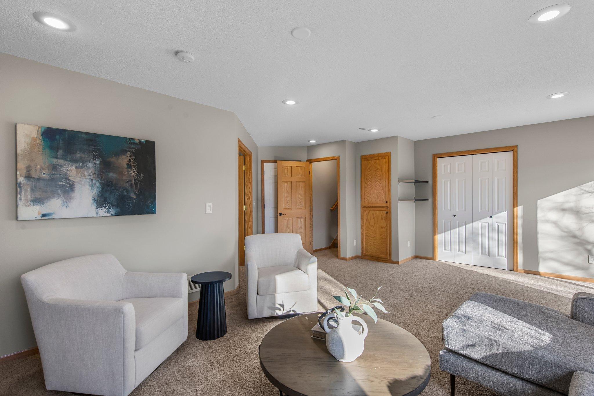 The lower level includes a large storage closet and access to an expansive 30x21 crawl space, perfect for storing seasonal items or extra belongings.