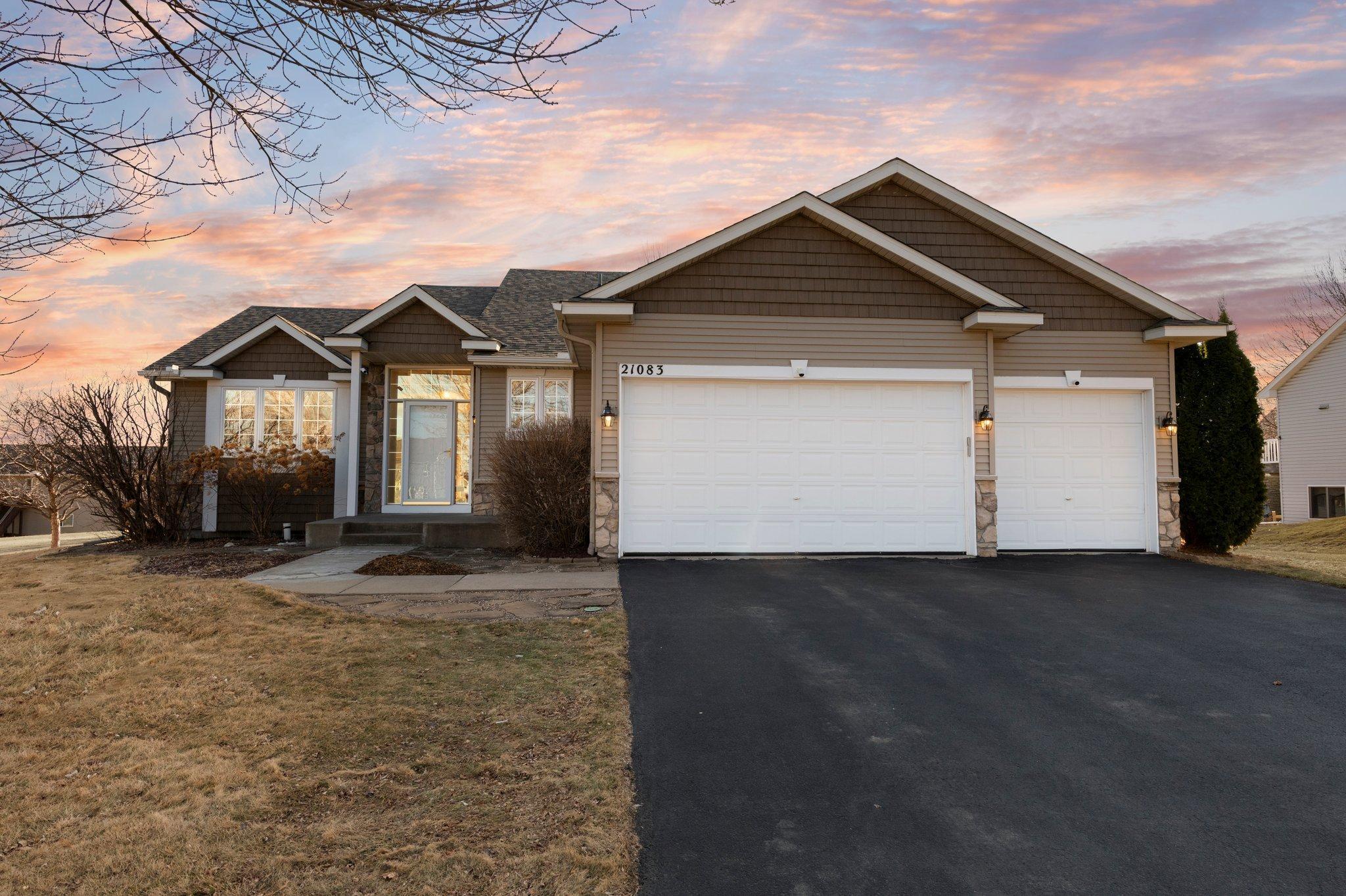 Charming 4-bedroom, 3-bathroom home nestled in a peaceful Rogers neighborhood.