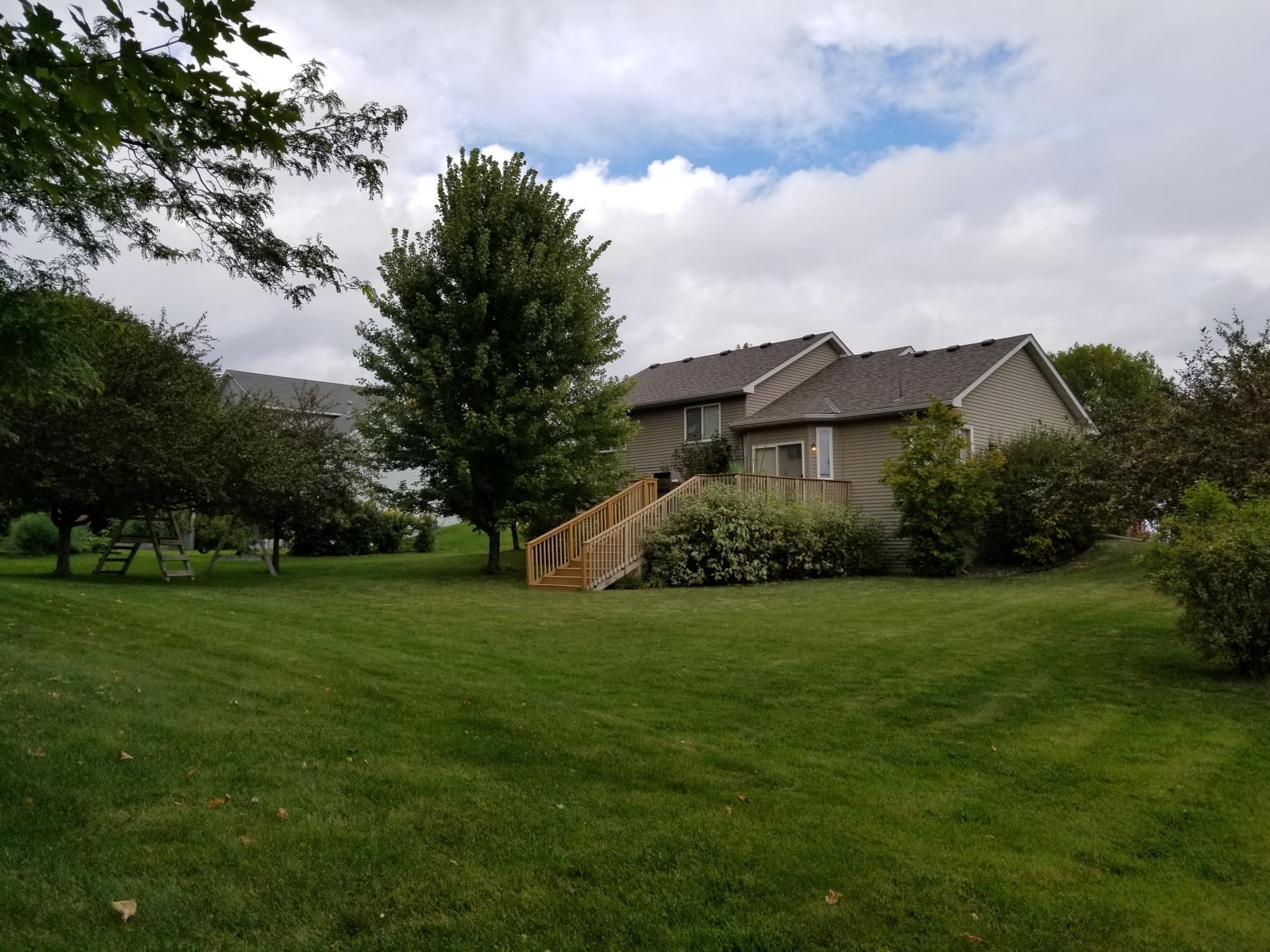 The expansive backyard, kept lush and green with the help of an in-ground sprinkler system.