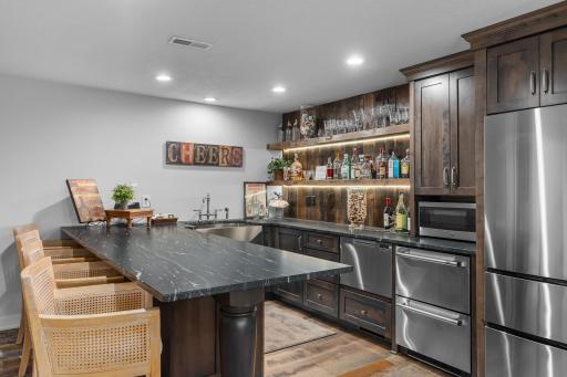 The wet bar has all the appointments that you could want.