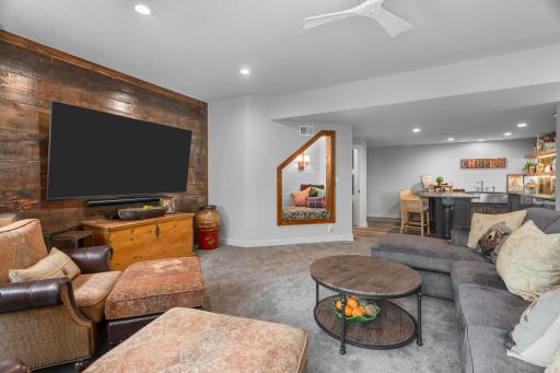 The family room has room for a theatre, a full kitchen and access to the huge patio.