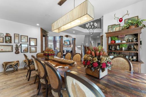 The formal dining room carries the reclaimed hardwood floors throughout the main level.