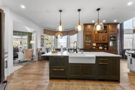The incredible kitchen has new cabinetry, countertops, appliances, lighting, and special spaces.