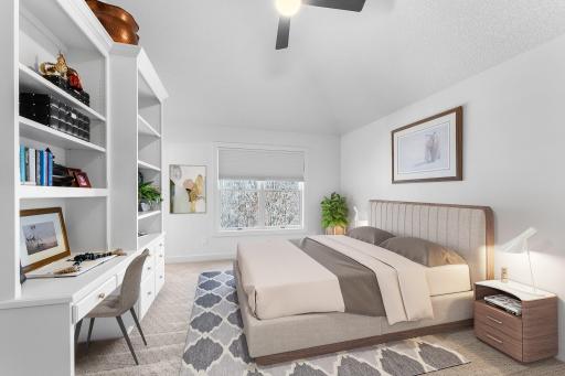 Bedroom two has built-in shelving, a desk, a full bathroom and a 'double walk-in' closet.