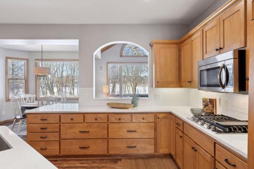 Anywhere in the home, your attention is drawn to the west-facing views of Cloverdale Lake