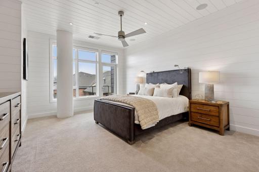 Spacious and bright primary suite with private balcony