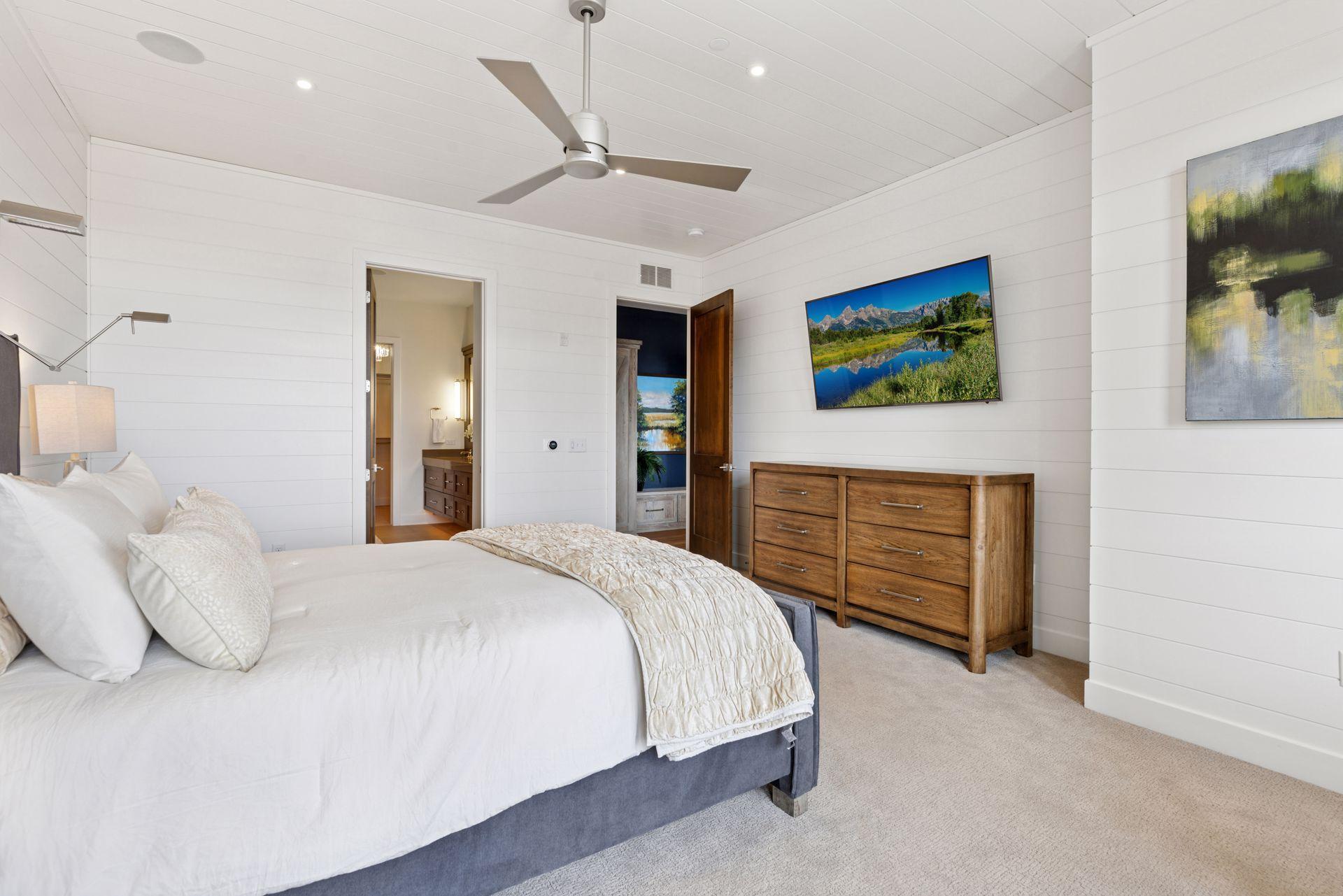 Extra detail of ship lap finishes the walls of the primary bedroom