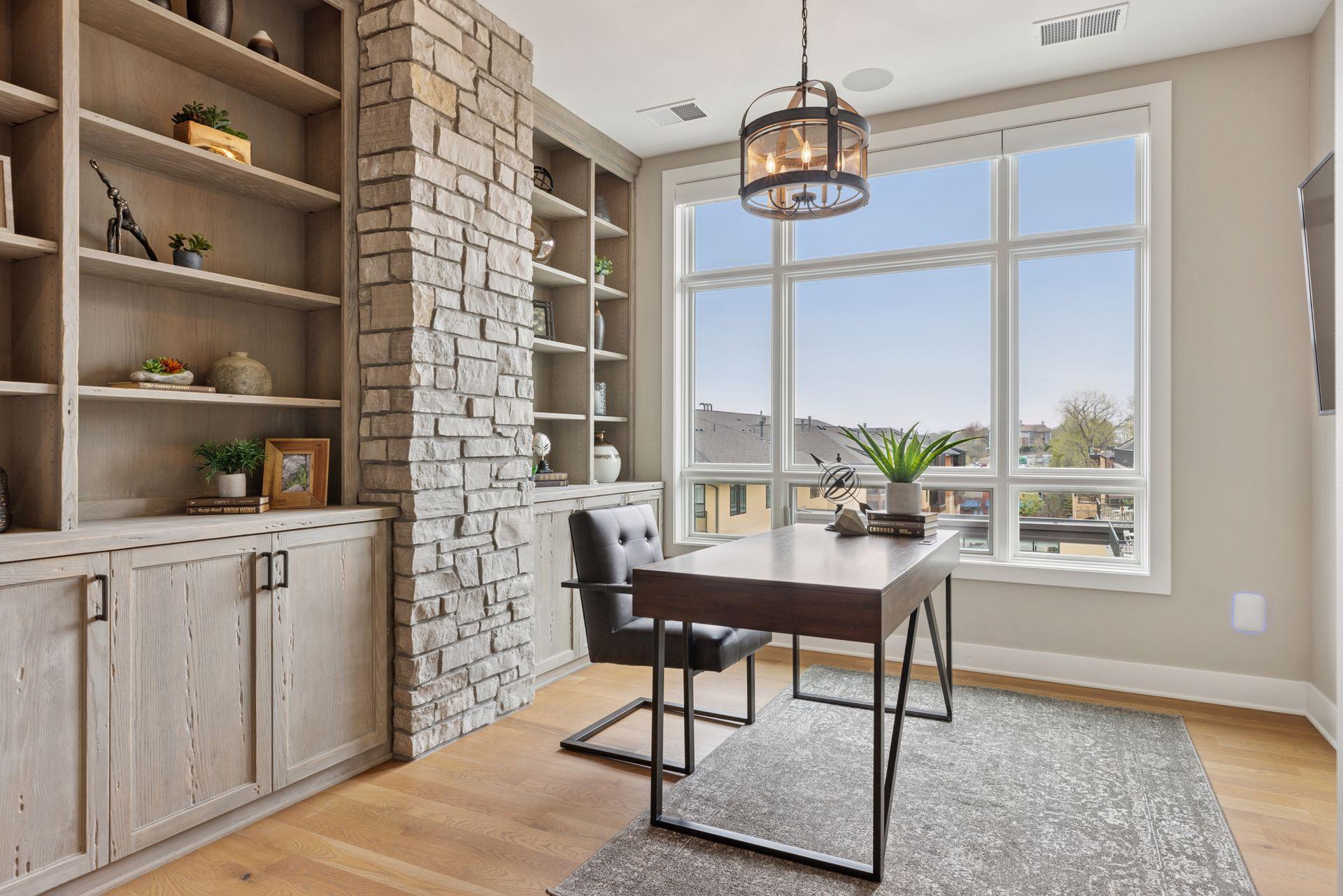 Flex space tucked behind the living area creates room for a designated home office or library