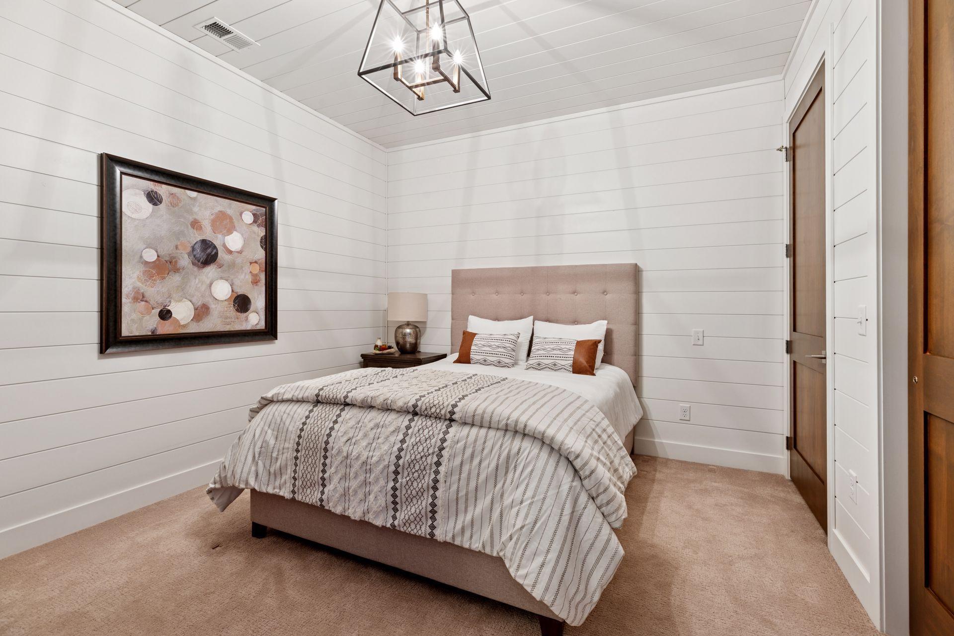 A secondary bedroom is located near the foyer