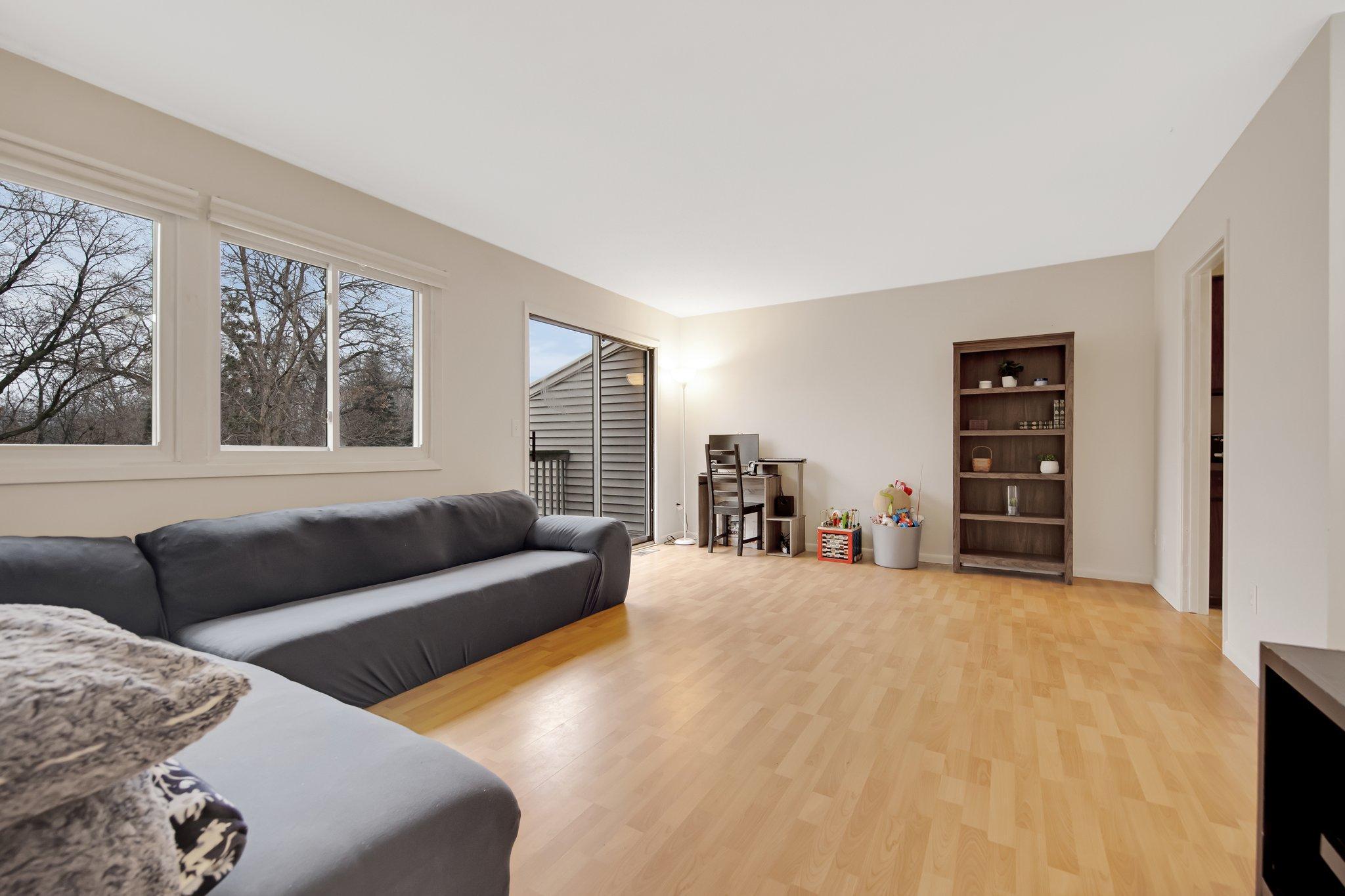 Spacious living room with new flooring in 2020