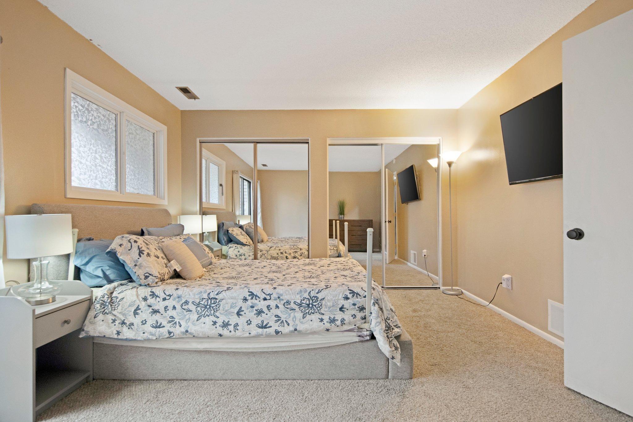 Lower level main bedroom with two closets