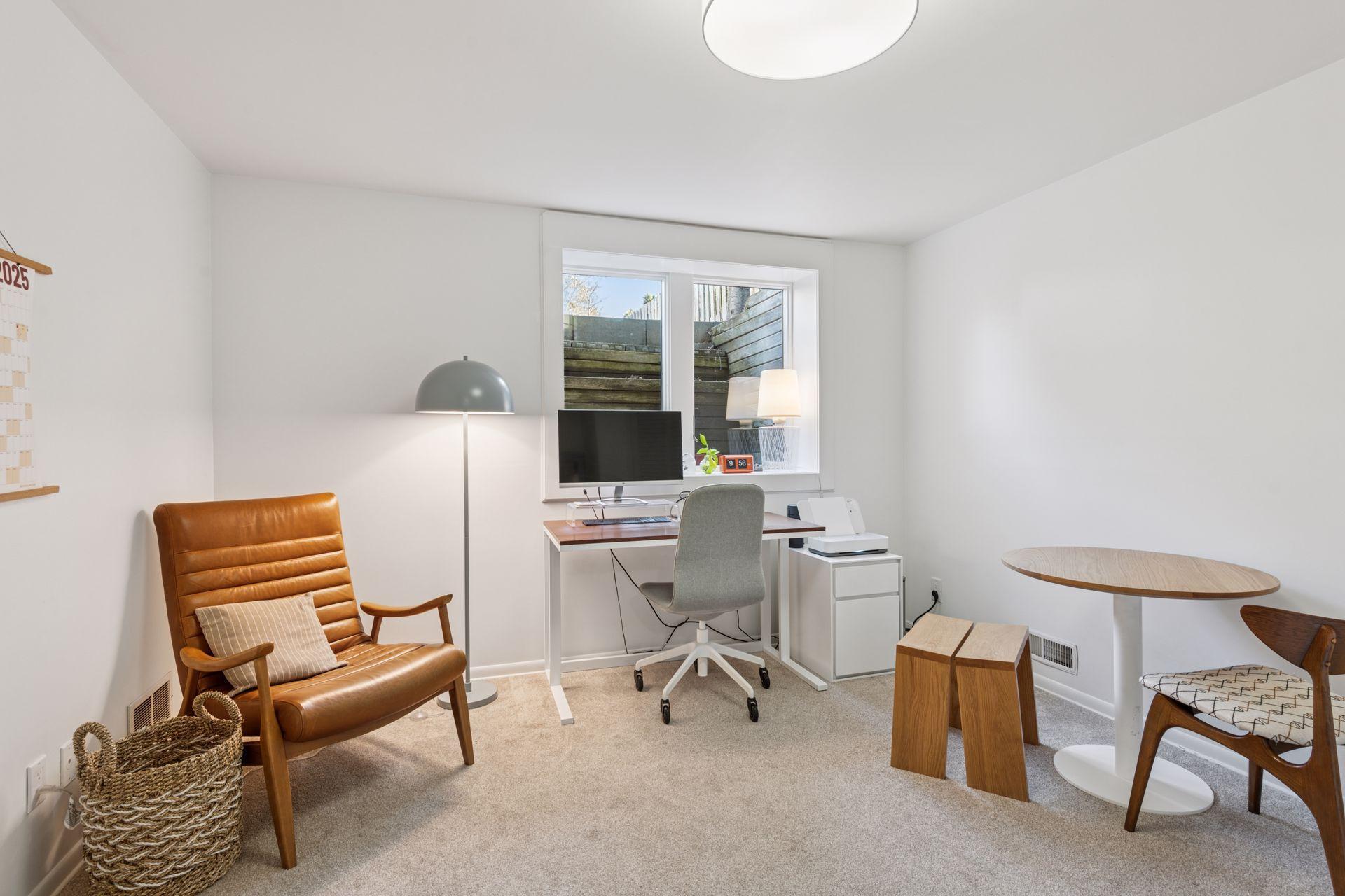 Lower level bedroom with large garden view egress.