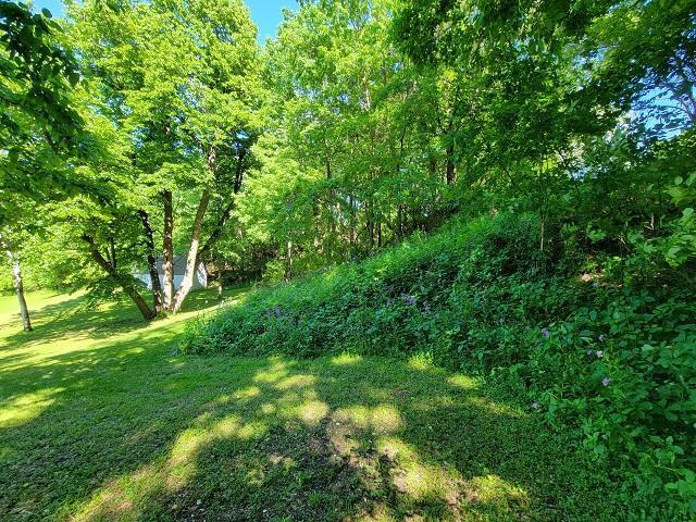 Across top of property from left to right