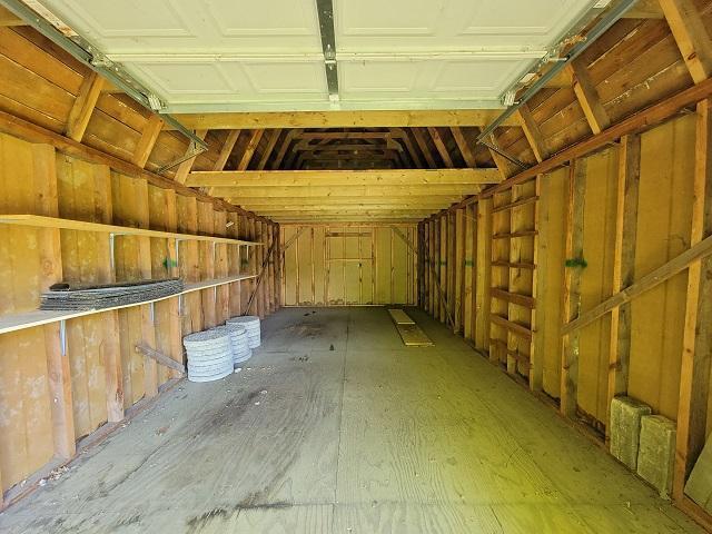 Oversized shed / garage with overhead storage