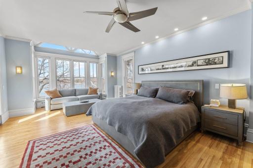 The primary suite overlooks Lake of the Isles