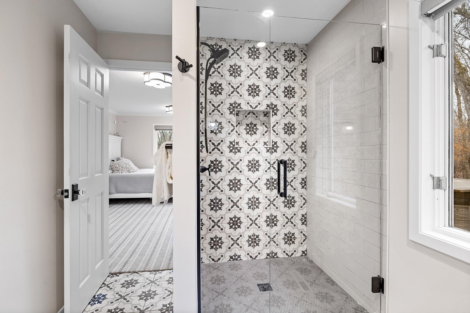 Tile floors and walk-in shower.