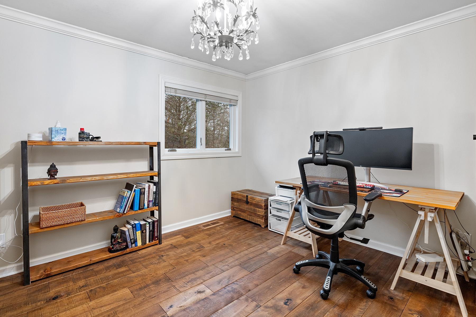 Upper level bedroom would also make a great office or studio.