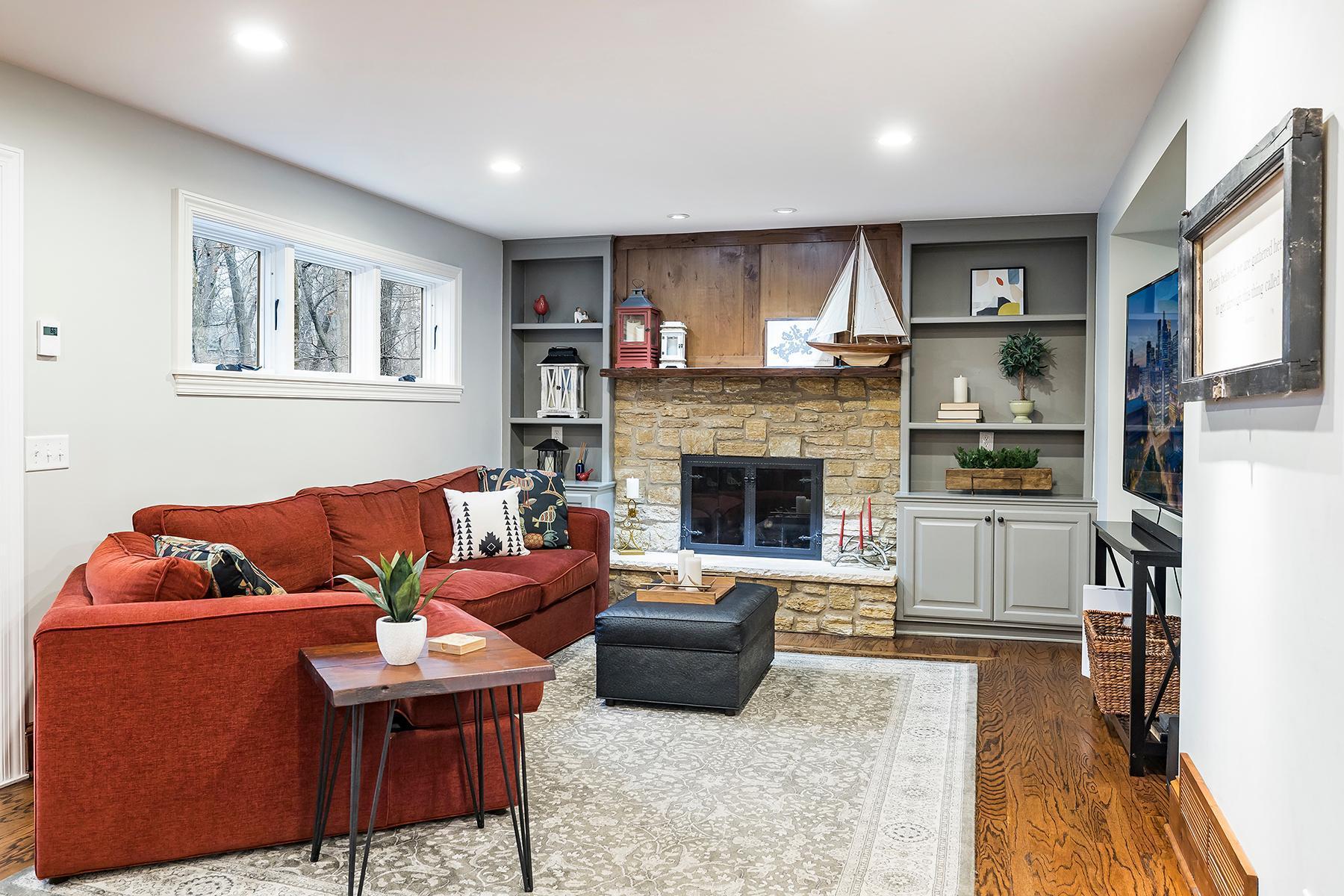 Family room with gas fireplace and built-ins.