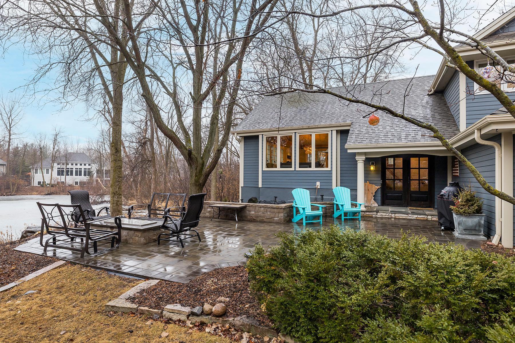 Professionally landscaped patio and fire pit.