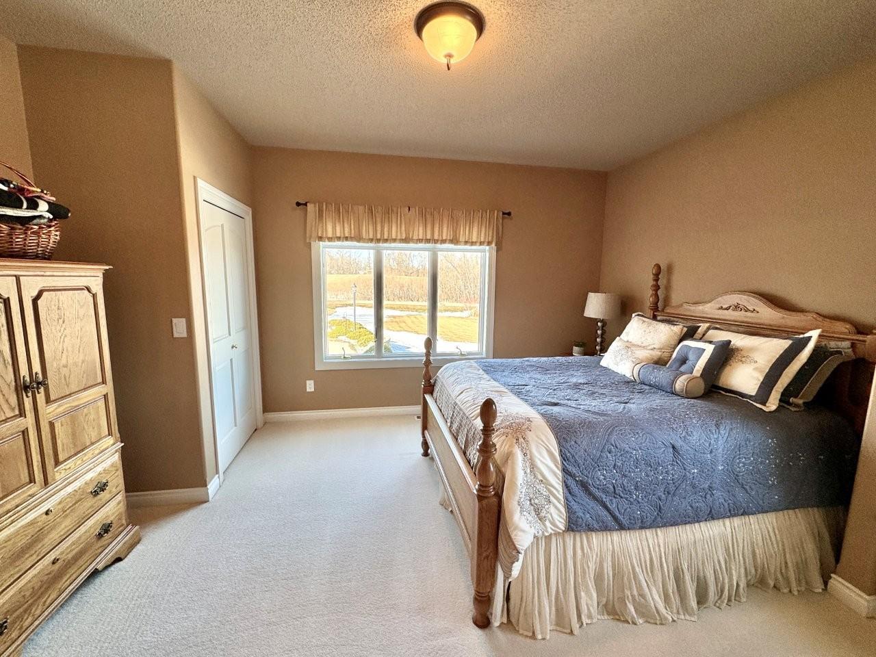 18-Bedroom 2 - main floor (2).jpg