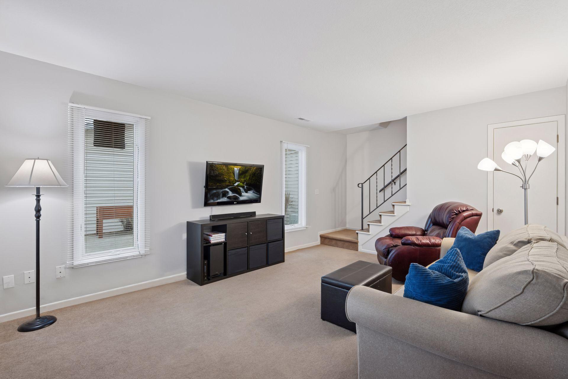 Enjoy a movie night or watch the big game in the main floor living room