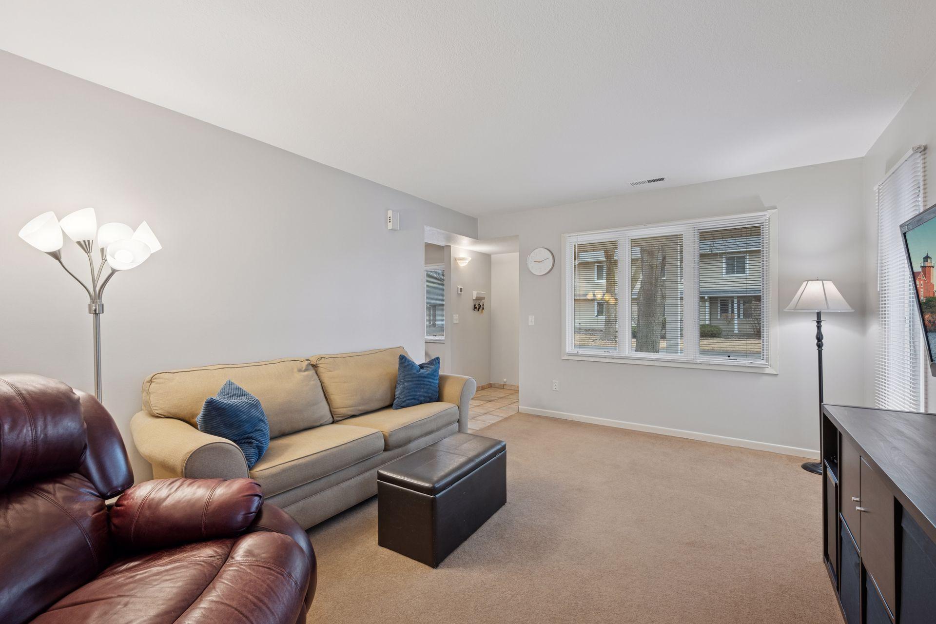 Spacious living room with a lot of natural light