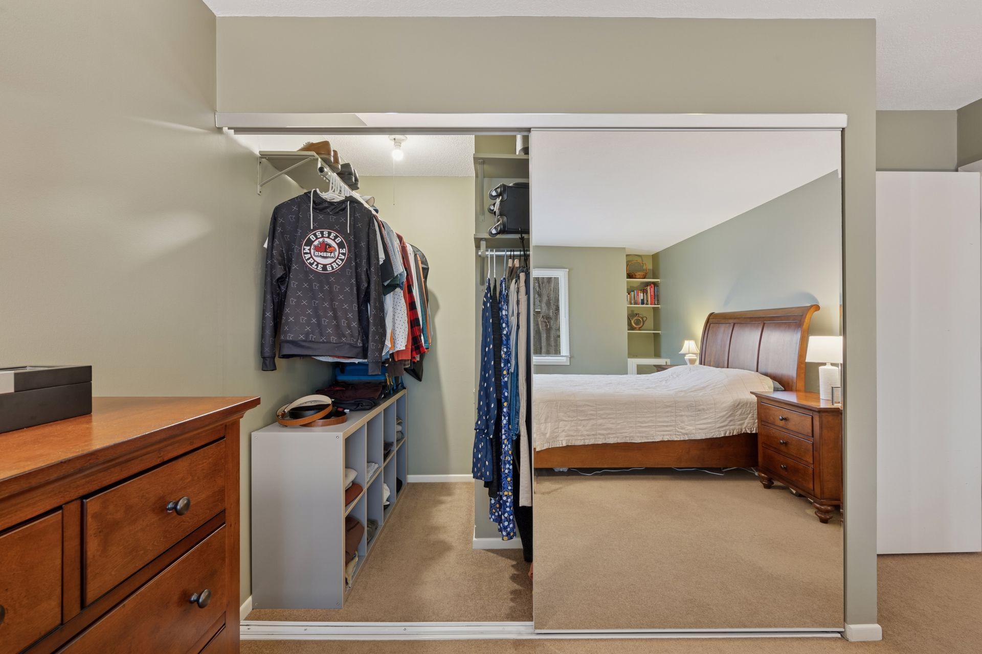 Walk in closet in the primary bedroom