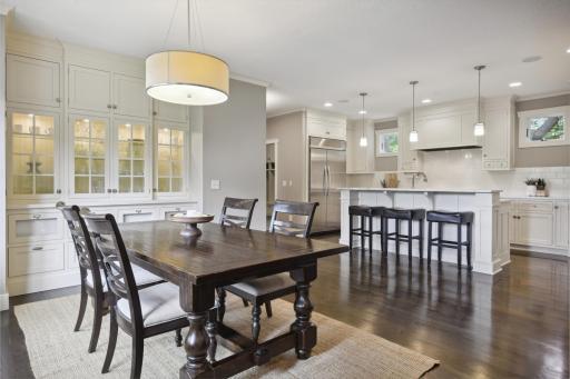 Adjacent to the living room is the informal dining and kitchen