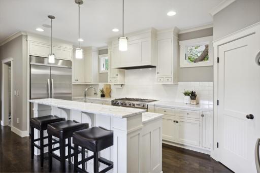 Wonderfully appointed with custom cabinetry and quartz counters