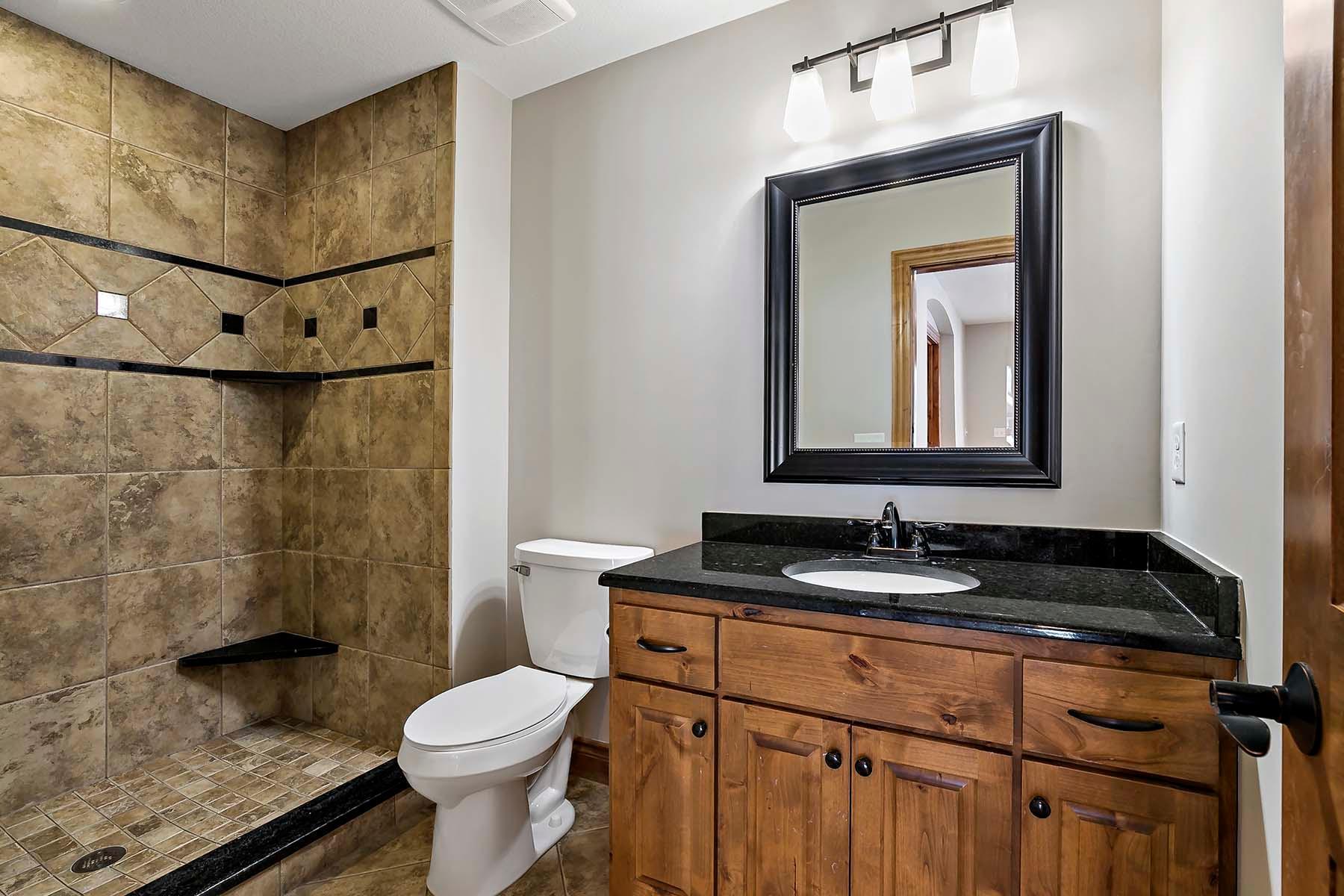 4th Bathroom is located on the lower level