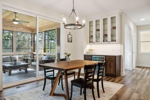 Informal Dining Room with a Breakfast Bar and Hutch