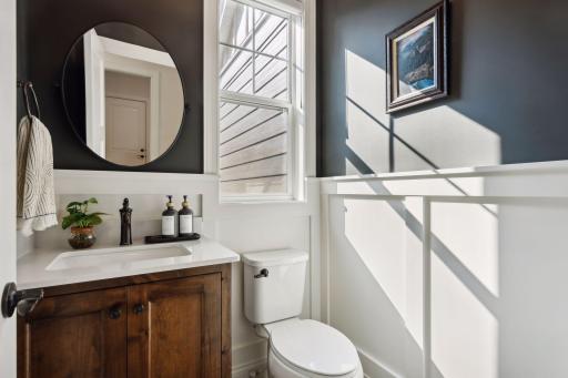 Main Floor Half Bath includes wainscoting finishes