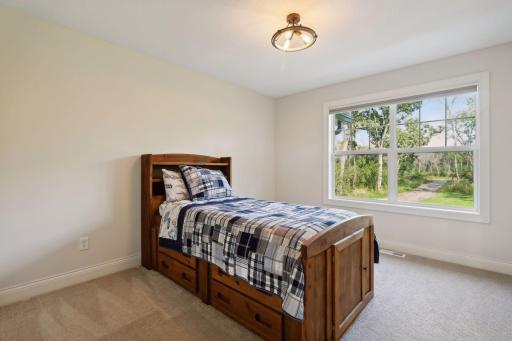 One of four bedrooms located on the Upper Level