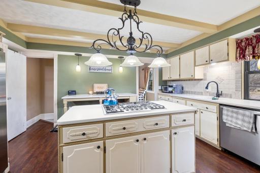 Breakfast bar & access to lower level off kitchen