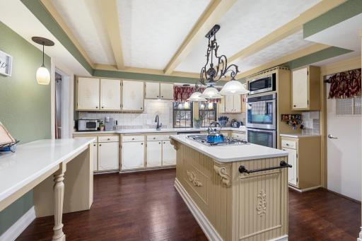 Kitchen windows to front yard & access to attached garage