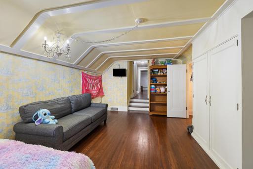 Features step down, secret closet nook, chandelier...