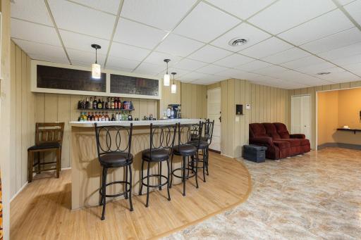 Owner's access behind wet bar - leading to attached garage