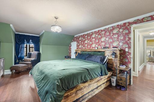 Oversized king bed frame in massive bedroom