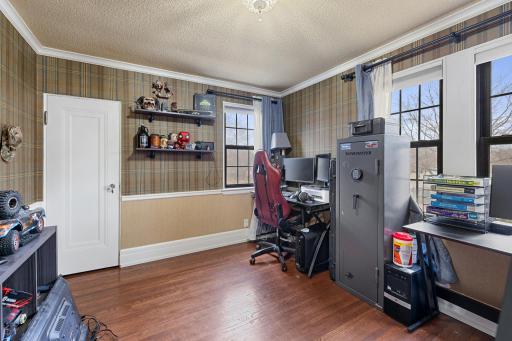 Spacious fourth bed overlooking back yard